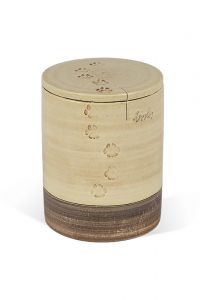 Pet cremation ashes urn with paw print