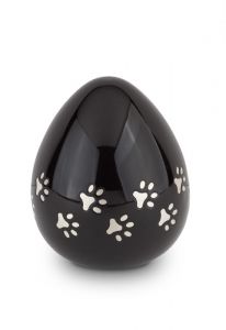 Black pet urn with silver coloured pawprints 'Coco'